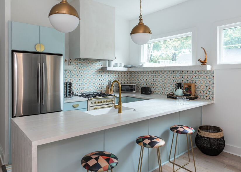 Modern kitchen with pendant lights & bar top