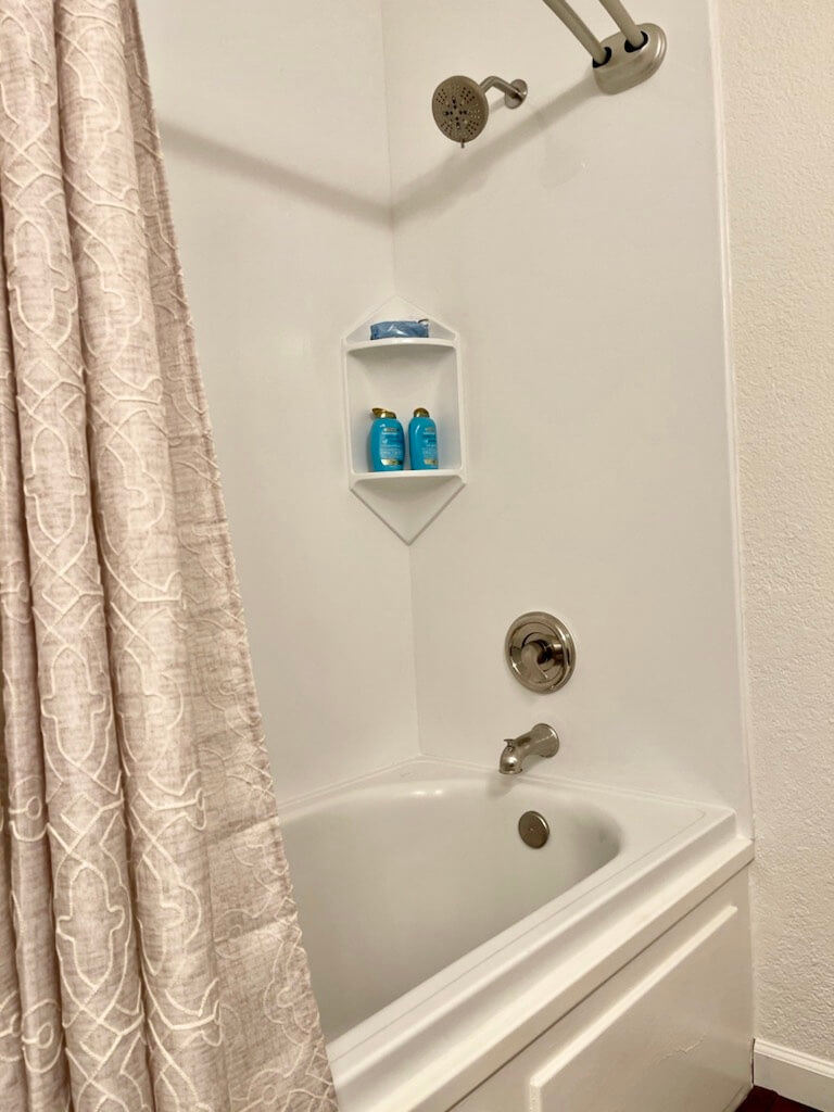 Bathroom 2 has a shower bathtub combo