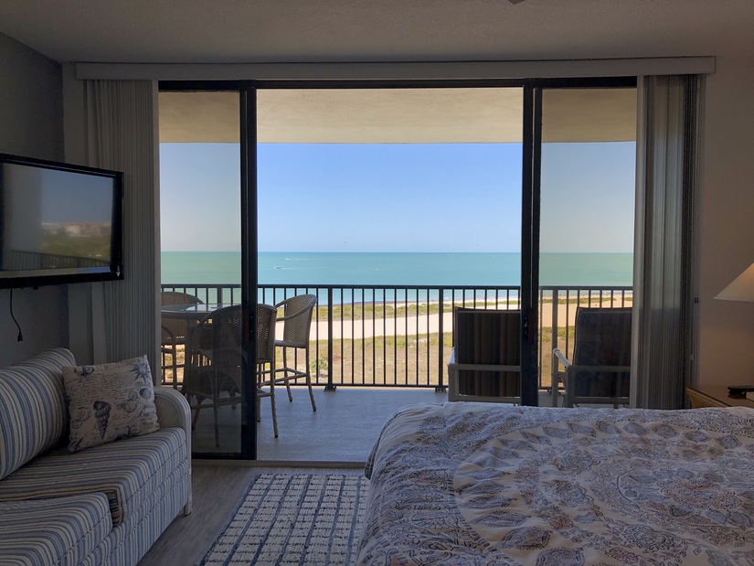 Master bedroom with king bed and view