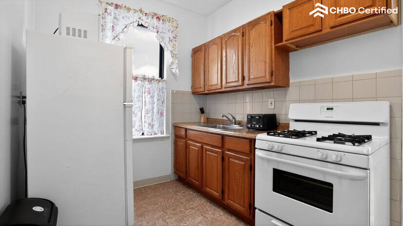 Bright Kitchen with Modern Appliances and Cabinetry