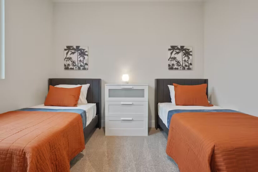 Two twin beds in one of our spacious bedrooms