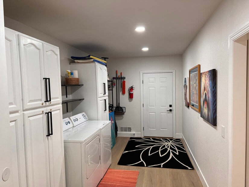 large laundry room with lots of storage