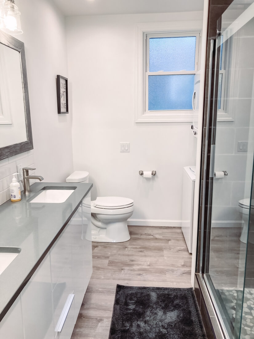 Large remodeled bathroom, with washer dryer