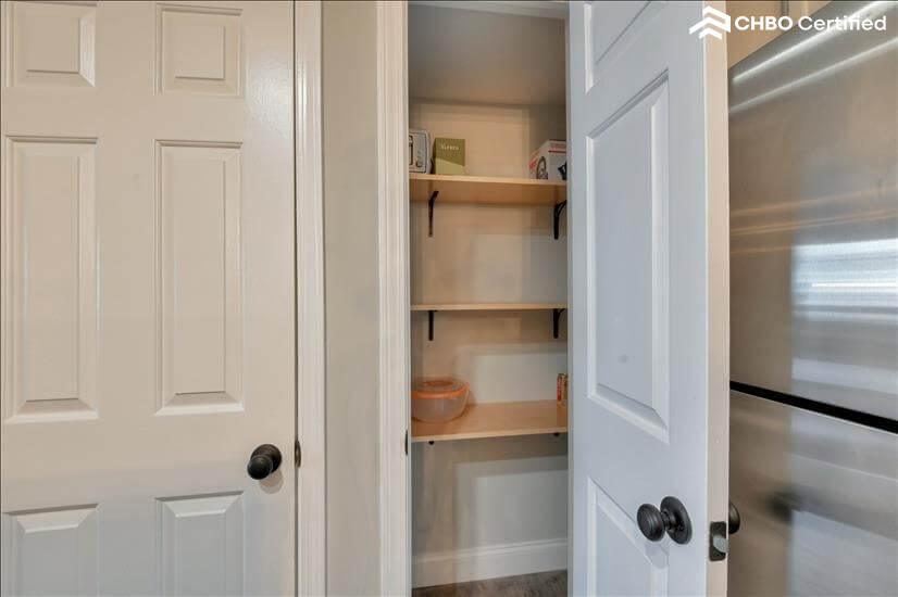 Walk in pantry with lots of shelves