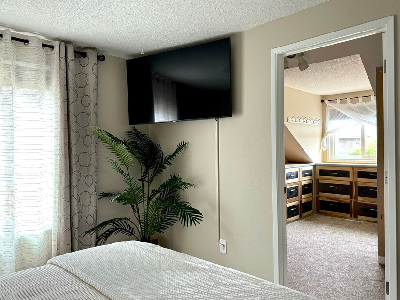 Master 55” TV and closet entry