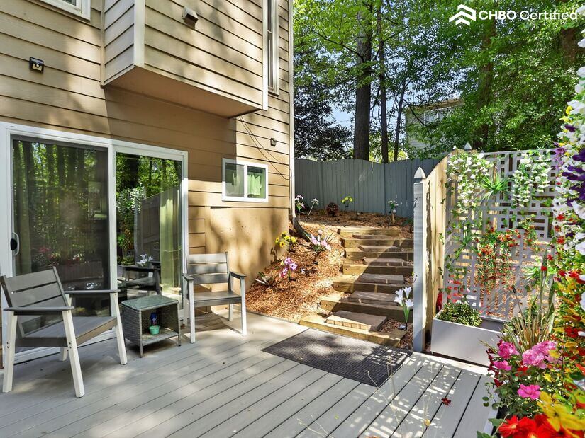 Stone walkway to the private entrance in the screened patio