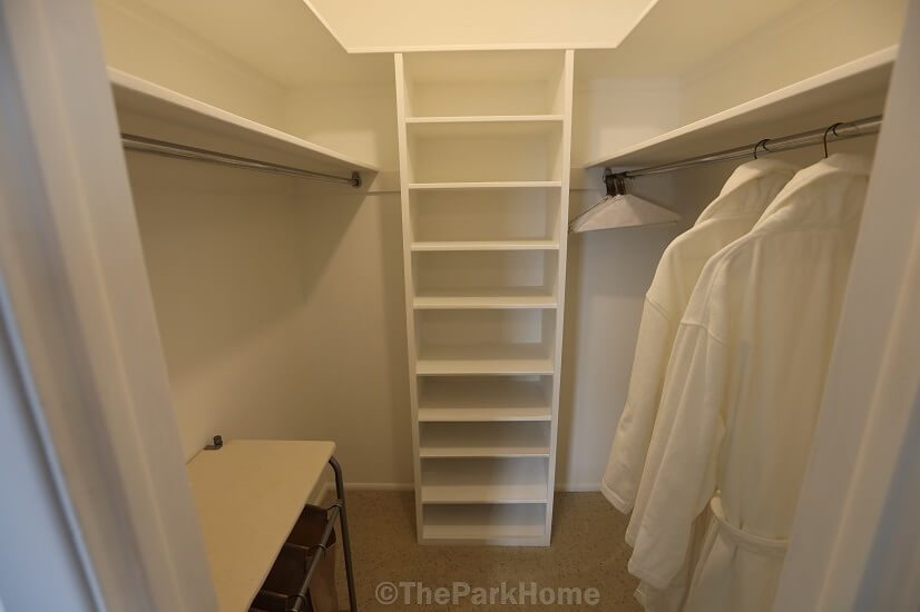 Primary closet with 30+ square feet and laundry hamper.