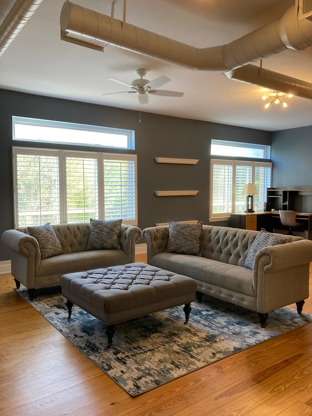 10 ft ceilings, modern lighting, exposed HVAC duct work