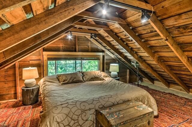Loft bedroom with 2 Romantic balconies overlooking living rm