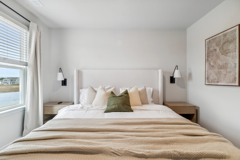 Serene retreat with olive green decor and soft textures.