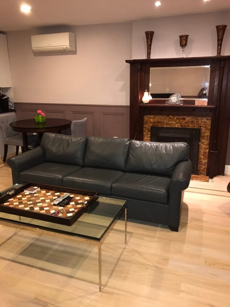 Living Room w/ decorative fireplace