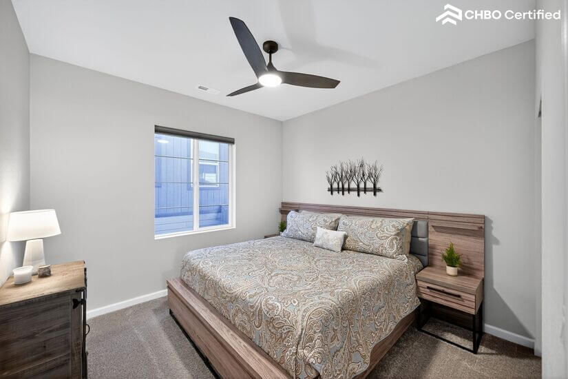 Upstairs guest room with King bed and furnishings