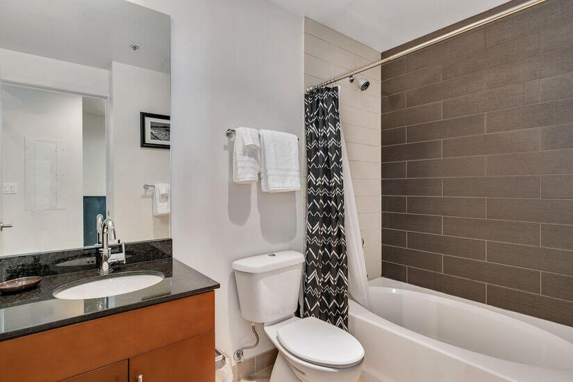 25th Floor Spire Condo Plus Den