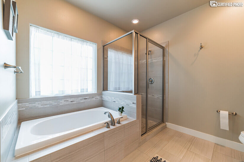 Walk in shower and tub in master bath