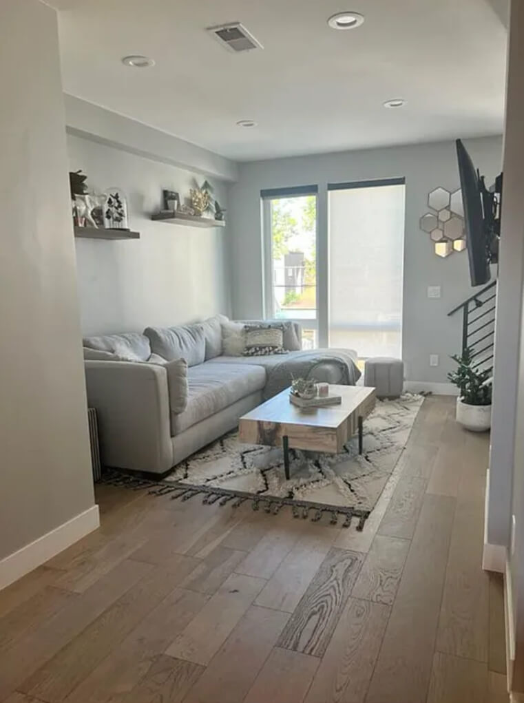 Living area with automatic shades.