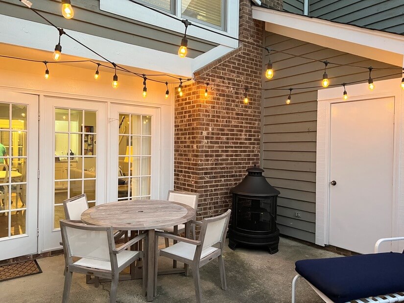 Enclosed patio with firepit and cooker