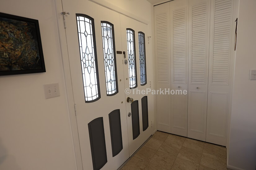 The front door and spacious entry closet.