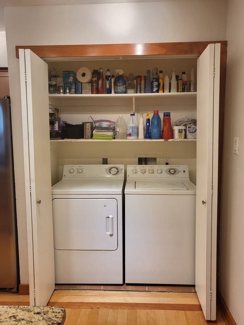 Full-sized washer/dryer just off kitchen
