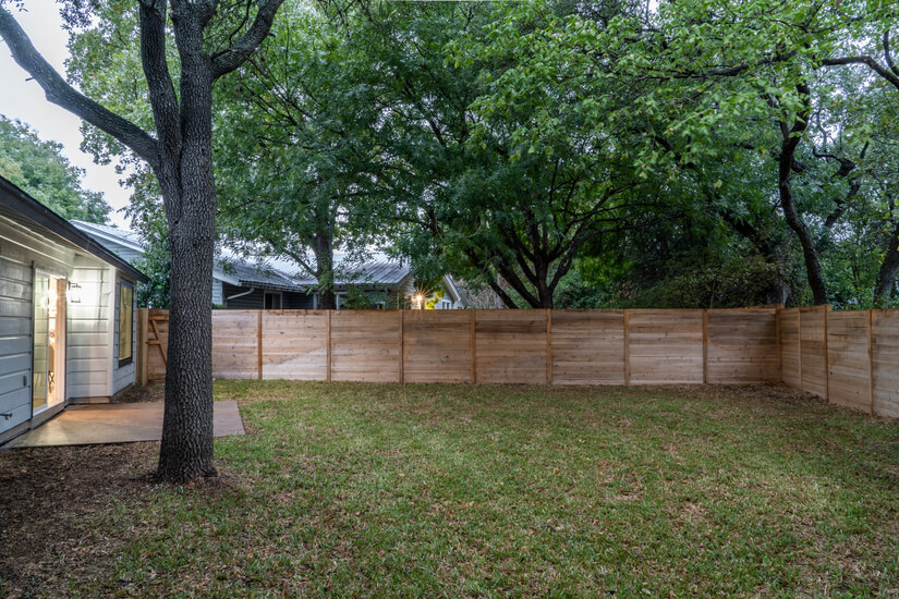 beautiful fenced private backyard