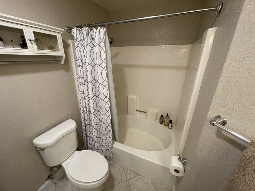 Primary bathroom has large tub shower