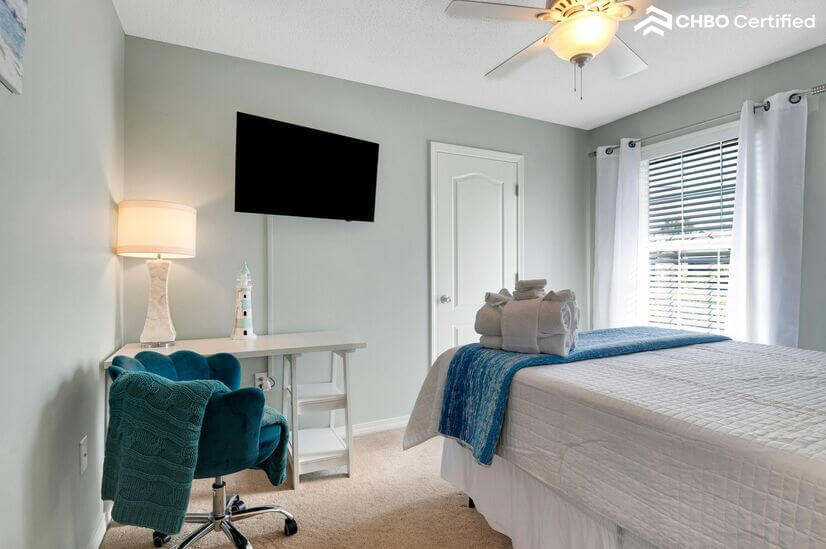 Work desk,swivel comfortable chair and queen bed- bedroom 3