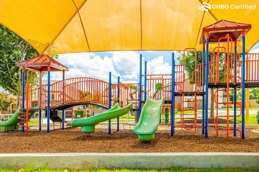 Children playground and walking trails next to the pool.