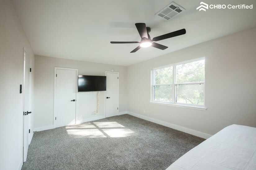 Smart TV and blackout shades for comfort and privacy