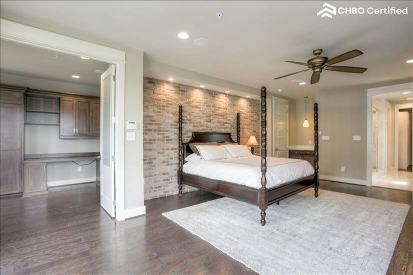 Brick accent wall in master bedroom