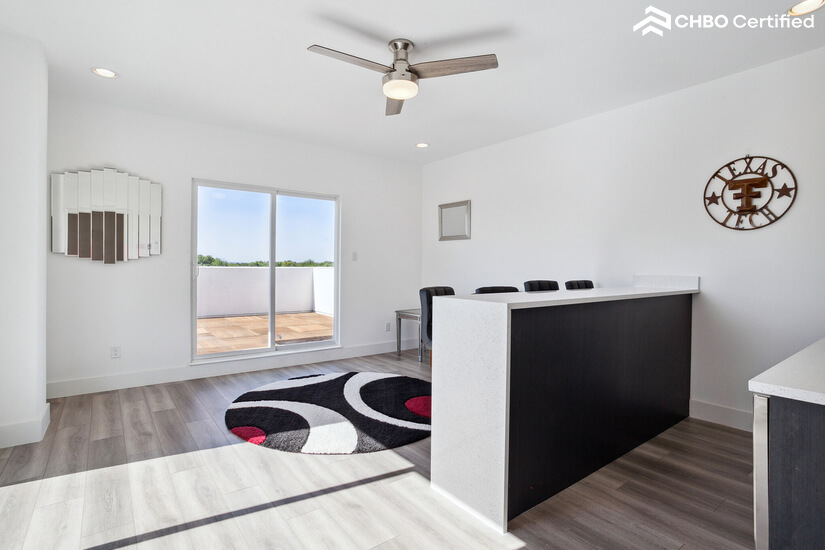 3rd floor wet bar with outdoor rooftop wooden deck!