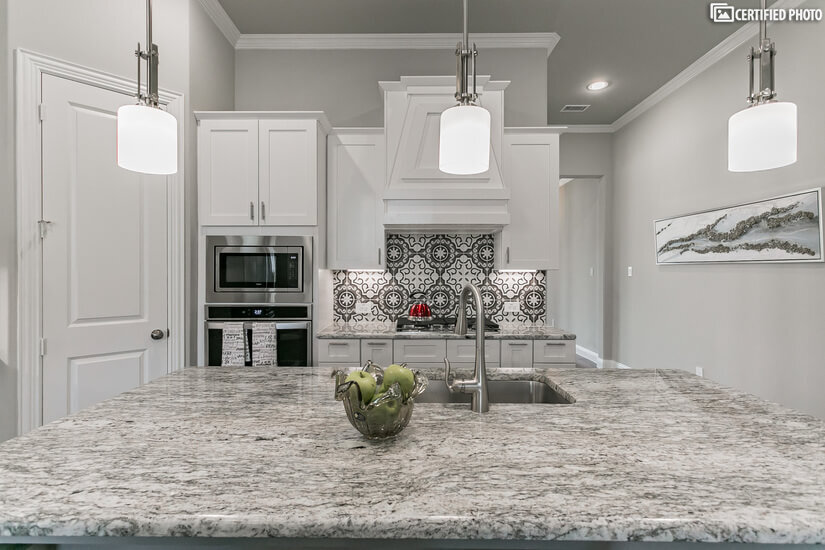 Granite Counters and Island in Kitchen