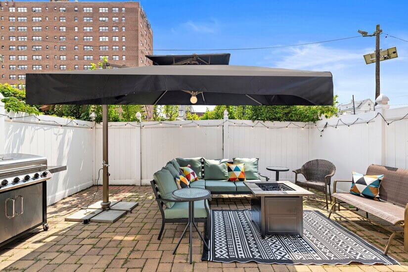 Backyard Patio with grill and fire pit table