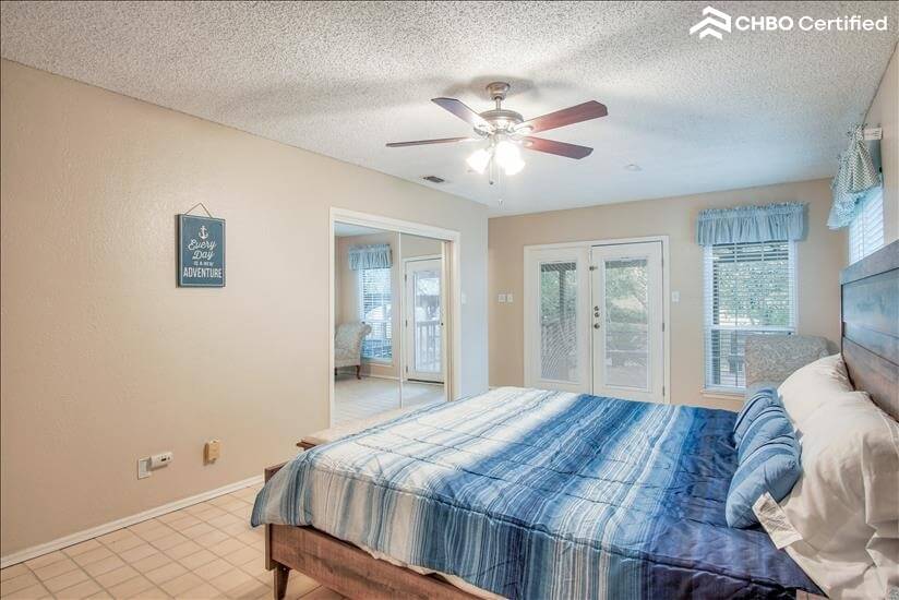 Master bedroom w/access to balcony
