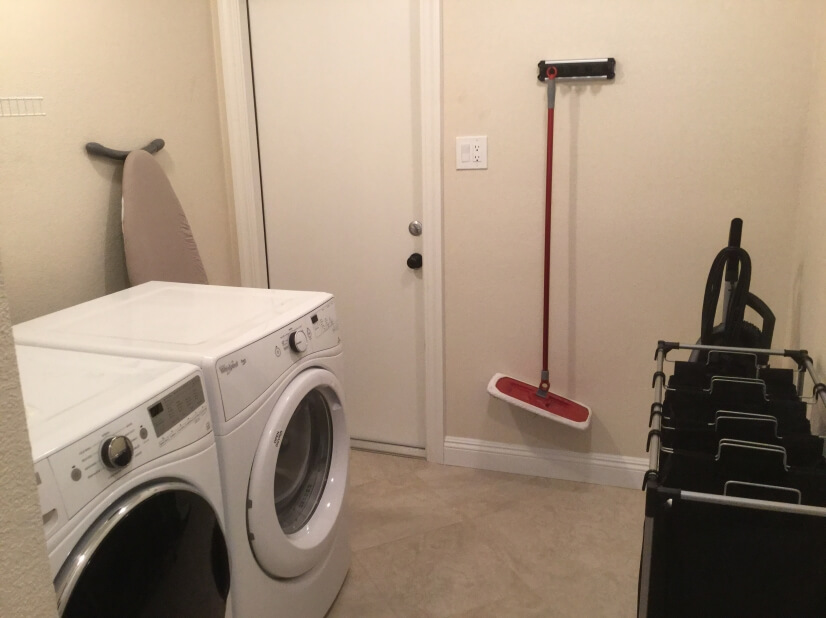 Laundry room and exterior door to RV parking