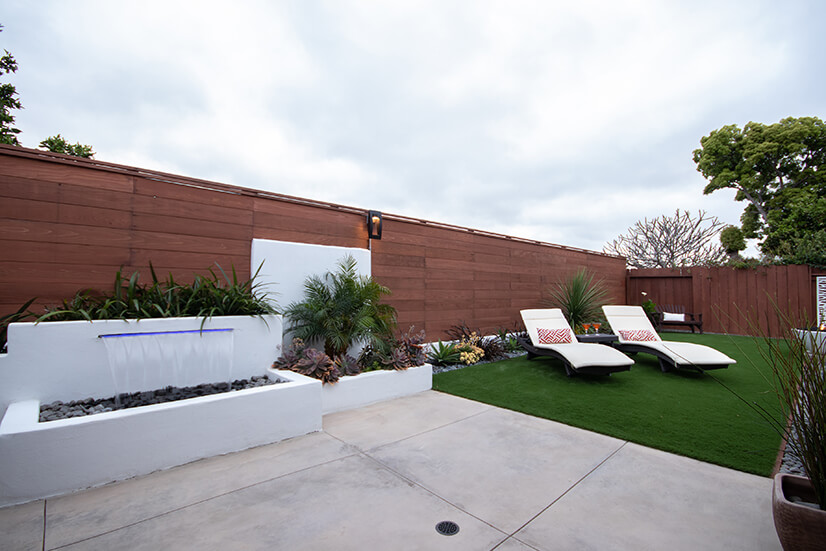 Water fountain and lounge chairs
