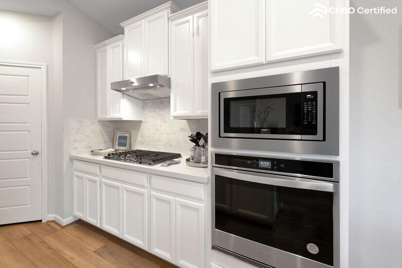 Kitchen with new stainless steel appliances
