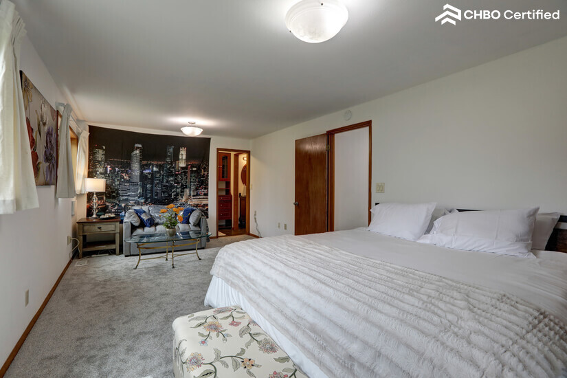 Master bedroom with crib , sofa bed 2