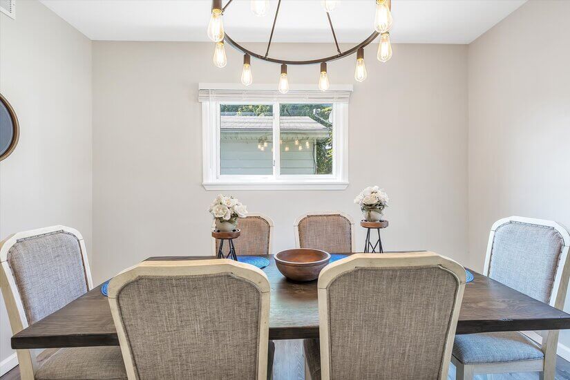 Dine in the light, bright dining room.