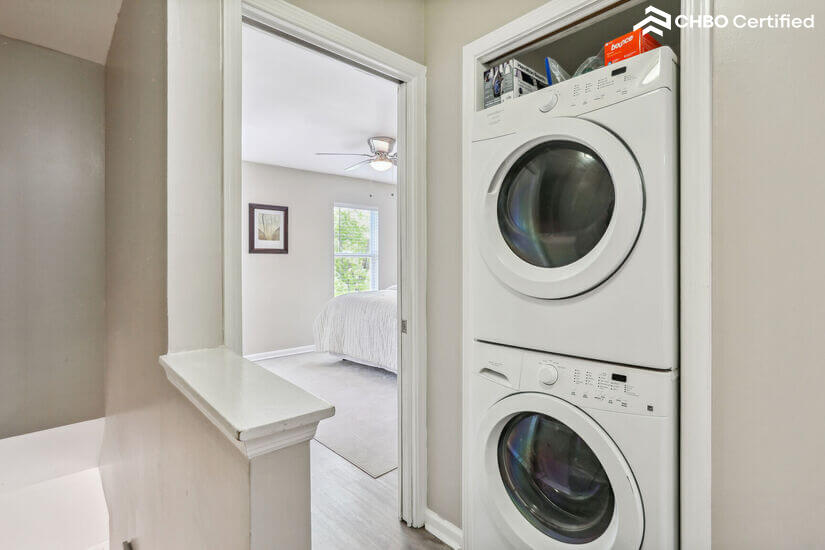 stacked washer and dryer on second floor