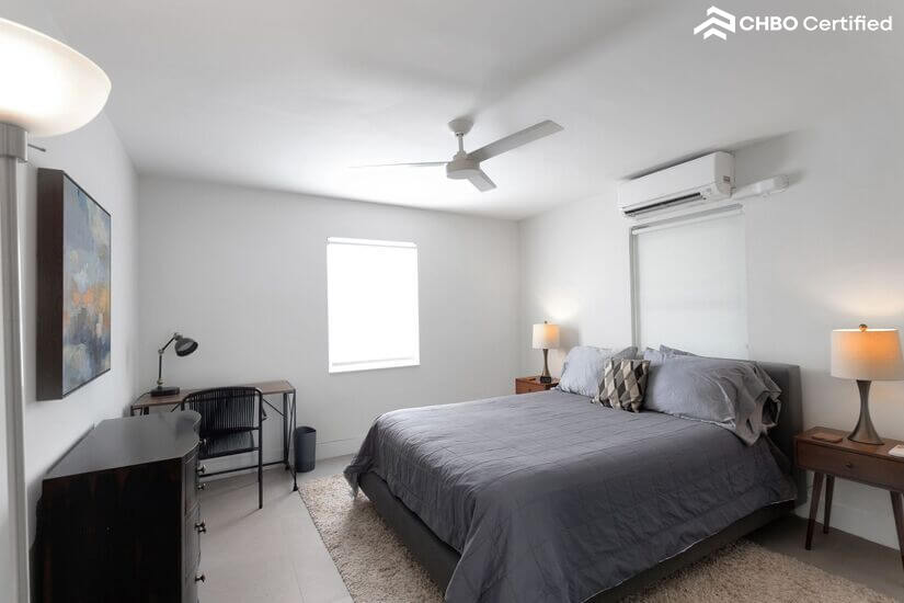 Larger bedroom with queen bed