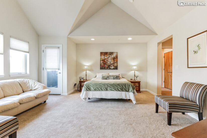 Upstairs bedroom with Vaulted Ceilings