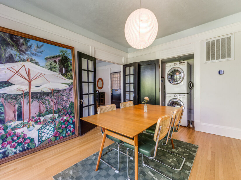 Dinning area that includes enclosed washer / dryer