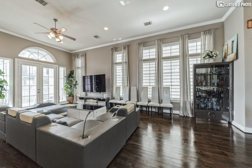 living room with 77 inch smart tv