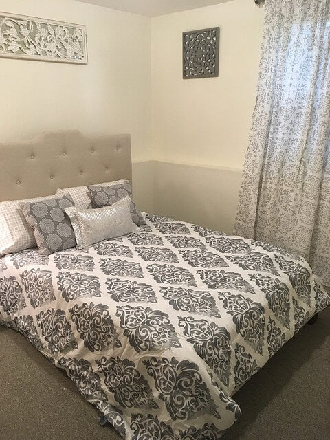 Newly furnished large bedroom with full wall of closets!