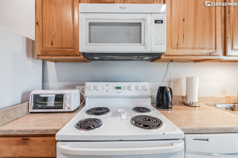 Full size oven, stove and small appliances.