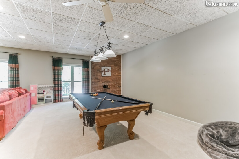 Pool table in entertainment room.