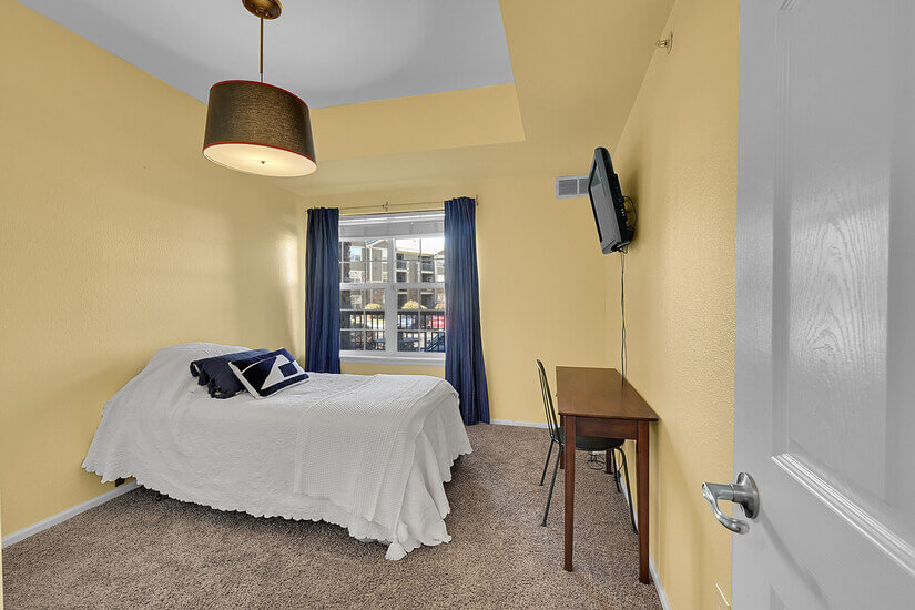 second bedroom twin bed desk, tv
