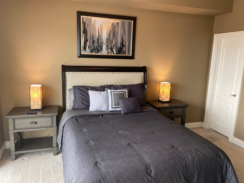 Bedroom with floor to ceiling windows