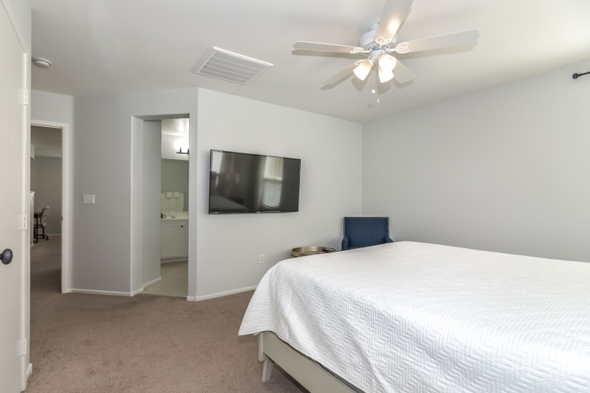 Master Bedroom with large 55 in Smart HDTV