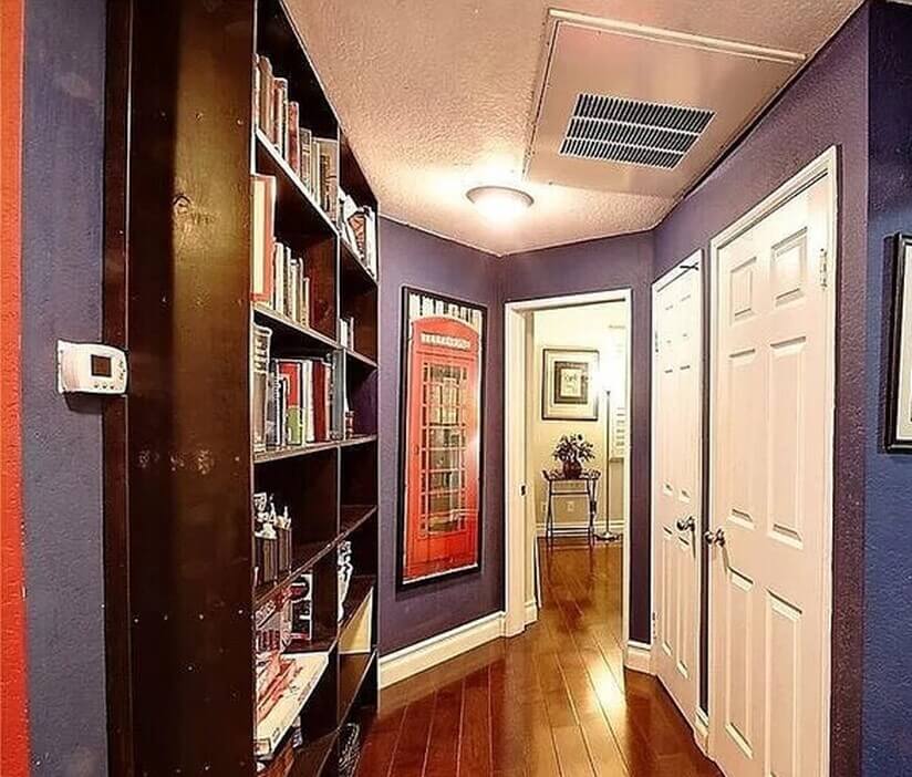 Hallway with linen closet & washer and dryer in unit