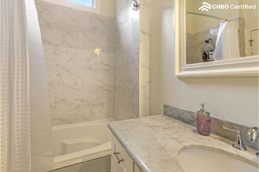 Master bath room with large tub and shower wi